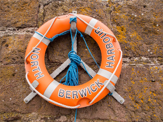 North Berwick, Scotland, UK. 23rd June 2015. Life belt at North Berwick Harbour.