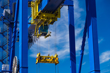 Closeup of a large container crane in Port of Rotterdam - 87680252