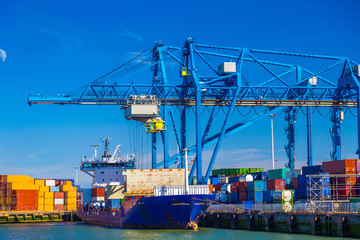 Large container vessel unloaded in Port of Rotterdam