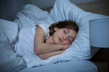 Girl Sleeping On Bed