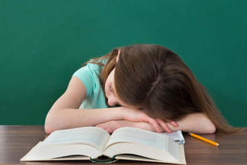 Student Sleeping At Desk