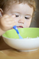 Portrait of cute male child eating