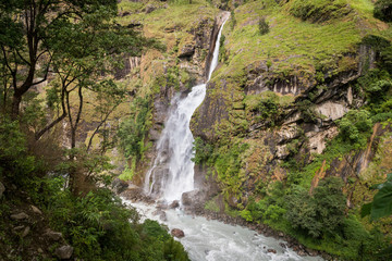 Fototapeta na wymiar Waterfall in Annapurna range, Himalaya, Nepal