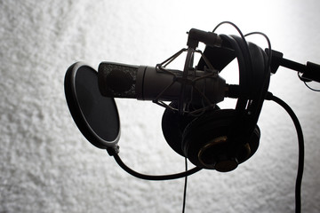 studio microphone and headphones sihouette