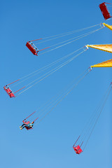 circular swing. photo on the background of sky swing at an amusement park
