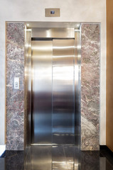 Elevator door in hotel lobby 
