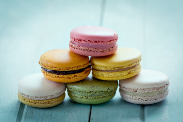 Sweet and colourful french macaroons in vintage color tone