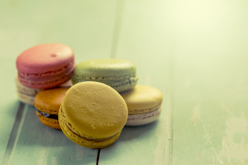 Sweet and colourful french macaroons in vintage color tone