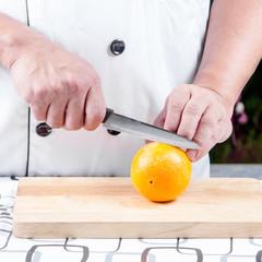 cutting orange