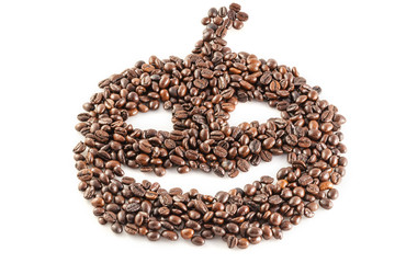 coffee beans in shape of jack o lantern on the white background