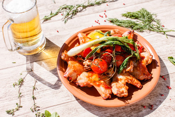 grilled chicken wings with vegetables