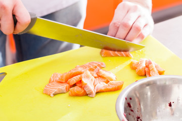 chef cutting fish