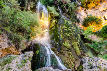 Fototapeta premium Waterfall in the village of Villecroze in Provence, France