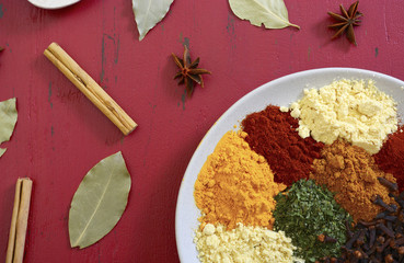 Colorful Cooking Spices On Wooden Table