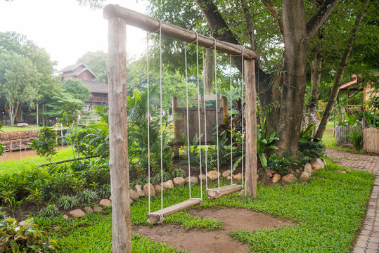 Empty Swing On Garden