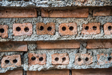 Red brick wall with mortar