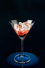 Wineglass with the wine and ice