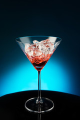 Wineglass with the wine and ice
