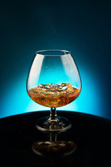 Wineglass with the whiskey and ice