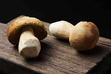 Ceps on wooden board