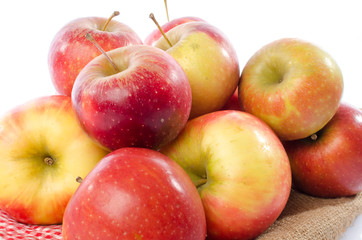 Fresh royal gala apples on a burlap bag