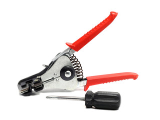 solid insulation stripper and screwdriver on a white background