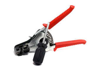 solid insulation stripper and screwdriver on a white background