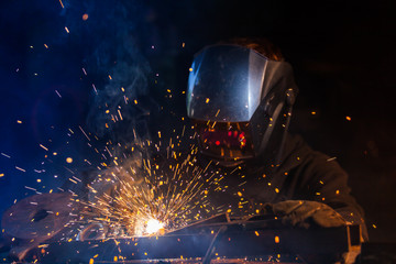 Welder in action. Low depth of focus