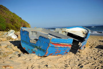 Boat wrecked on the beach, illegal immigration, Strait of Gibraltar, southern Europe