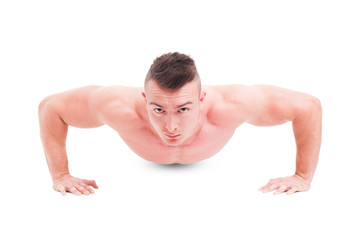 Obraz premium Man fitness instructor making push ups
