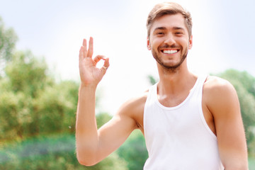 Active guy expressing positivity 