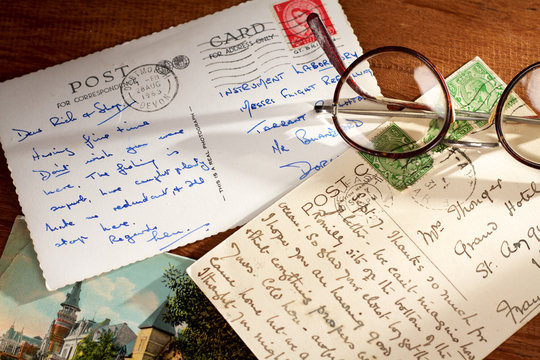 Postcards with nice handwriting and old glasses