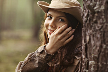 Young girl in the forest ranger