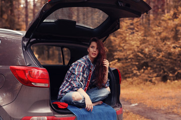 Girl autumn trip by car