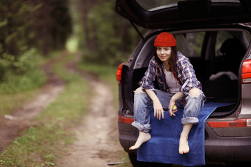 Young girl in the forest ranger