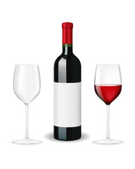 Bottle of red wine with two glasses and blank lable