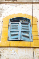  window in morocco africa yellow  brick historical