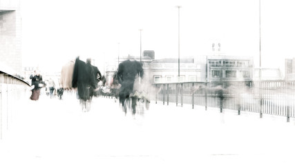 Rush hour commuters. Abstract long exposure, high key anonymous London City workers walking to work.