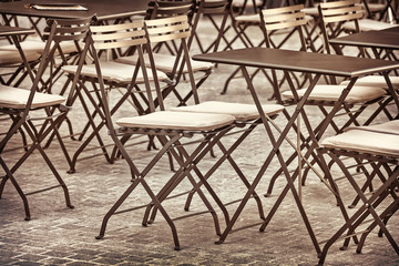 Retro styled image of restaurant chairs and tables