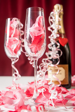 Love and Valentines: Bottle of champagne and glasses for two.