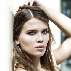 Fototapeta premium Close up portrait of a beautiful young girl