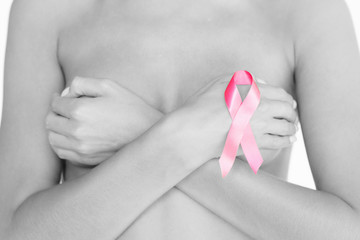 naked woman with breast cancer awareness ribbon