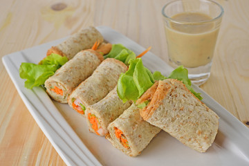 sandwich tuna roll with Mayonnaise and sesame sauce on plate