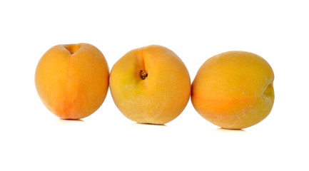 ripe peach on white background