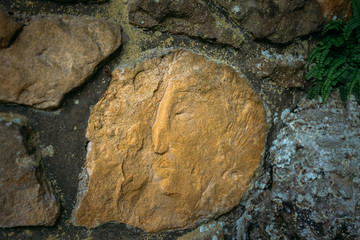 Bas-relief On The Stone Wall Of City Park In Luxembourg