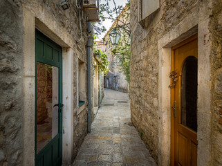 Fototapeta na wymiar Old town narrow street of Budva