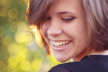 portrait of a beautiful brunette at sunset