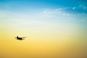 aircraft flying in the sky spraying mosquitoes