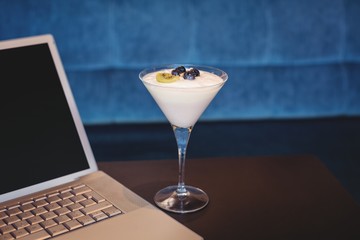 close up view of a laptop and a parfait