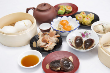 Group of stream Dim Sum chinese food and hot Tea